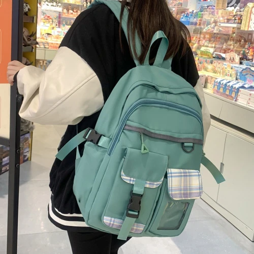 Korean version of spliced plaid backpack Harajuku style high value middle school
